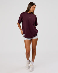 Woman wearing VS26 1% Better FLXCotton Oversize Tee - Cherry Lacquer-Off White | Model:Charli | Size:XS | Thumbnail Index: 10