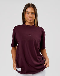 Woman wearing VS26 1% Better FLXCotton Oversize Tee - Cherry Lacquer-Off White | Model:Charli | Size:XS | Thumbnail Index: 17