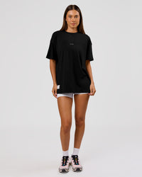 Woman wearing VS26 Journey FLXCotton Oversize Tee - Black-White | Model:Charli | Size:XS | Thumbnail Index: 13