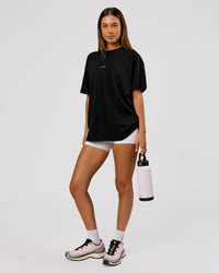 Woman wearing VS26 Journey FLXCotton Oversize Tee - Black-White | Model:Charli | Size:XS | Thumbnail Index: 15