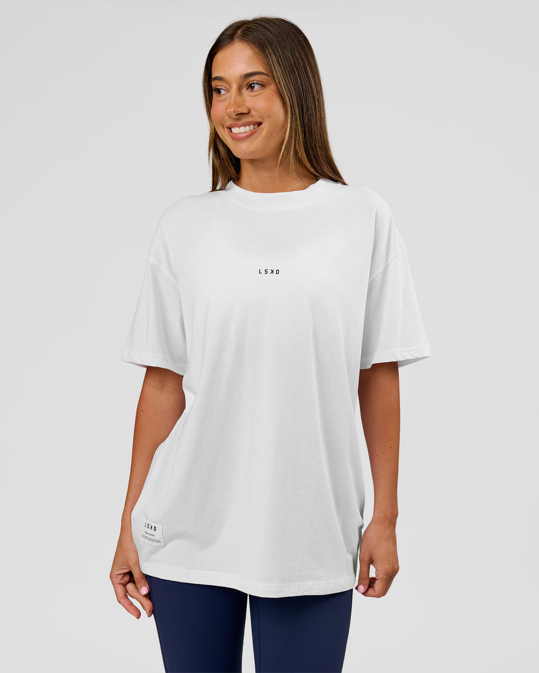 Woman wearing VS26 Journey FLXCotton Oversize Tee - White-Black | Model:Charli | Size:XS - view 6