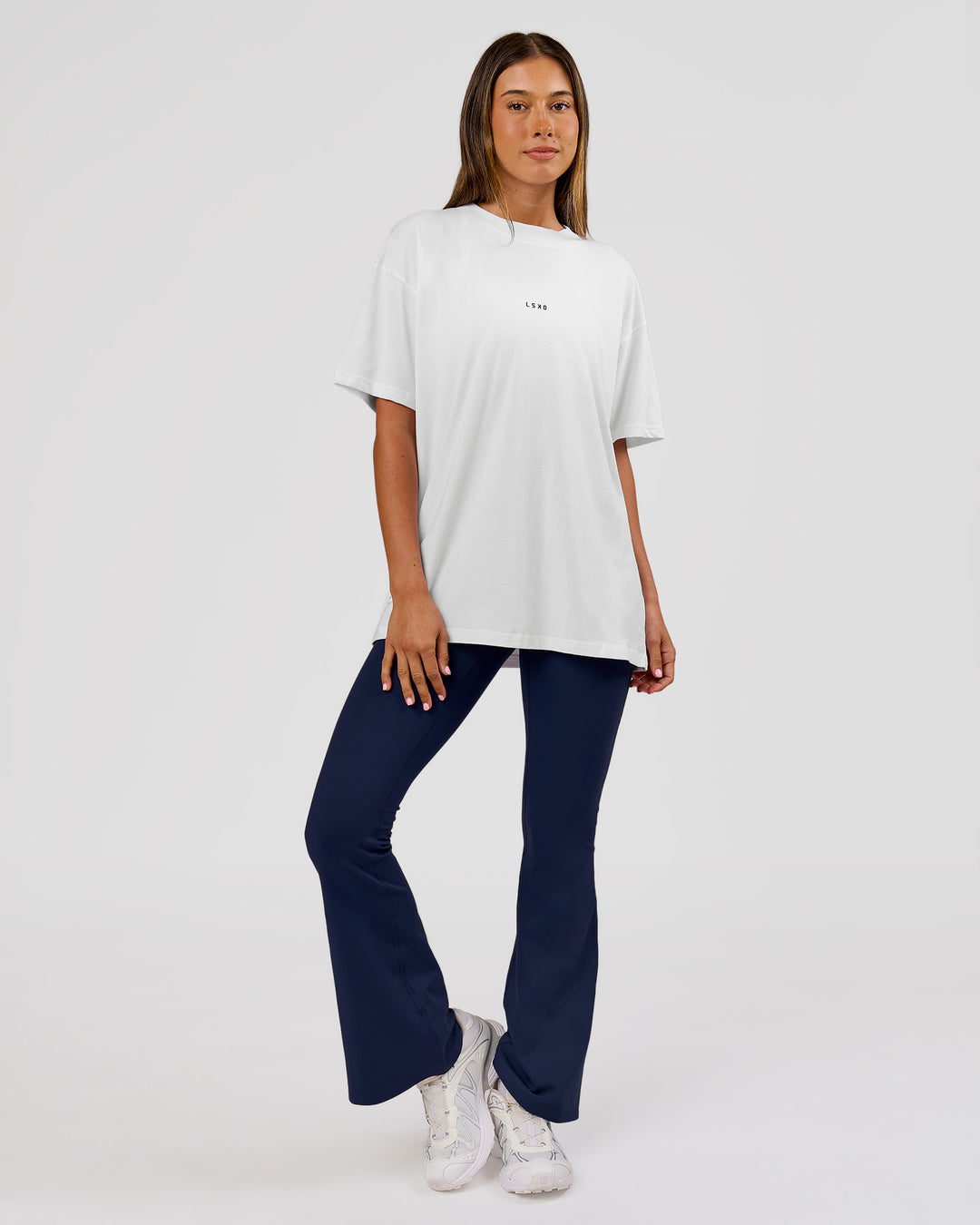Woman wearing VS26 Journey FLXCotton Oversize Tee - White-Black | Model:Charli | Size:XS - view 9