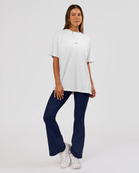 Woman wearing VS26 Journey FLXCotton Oversize Tee - White-Black | Model:Charli | Size:XS | Thumbnail Index: 8