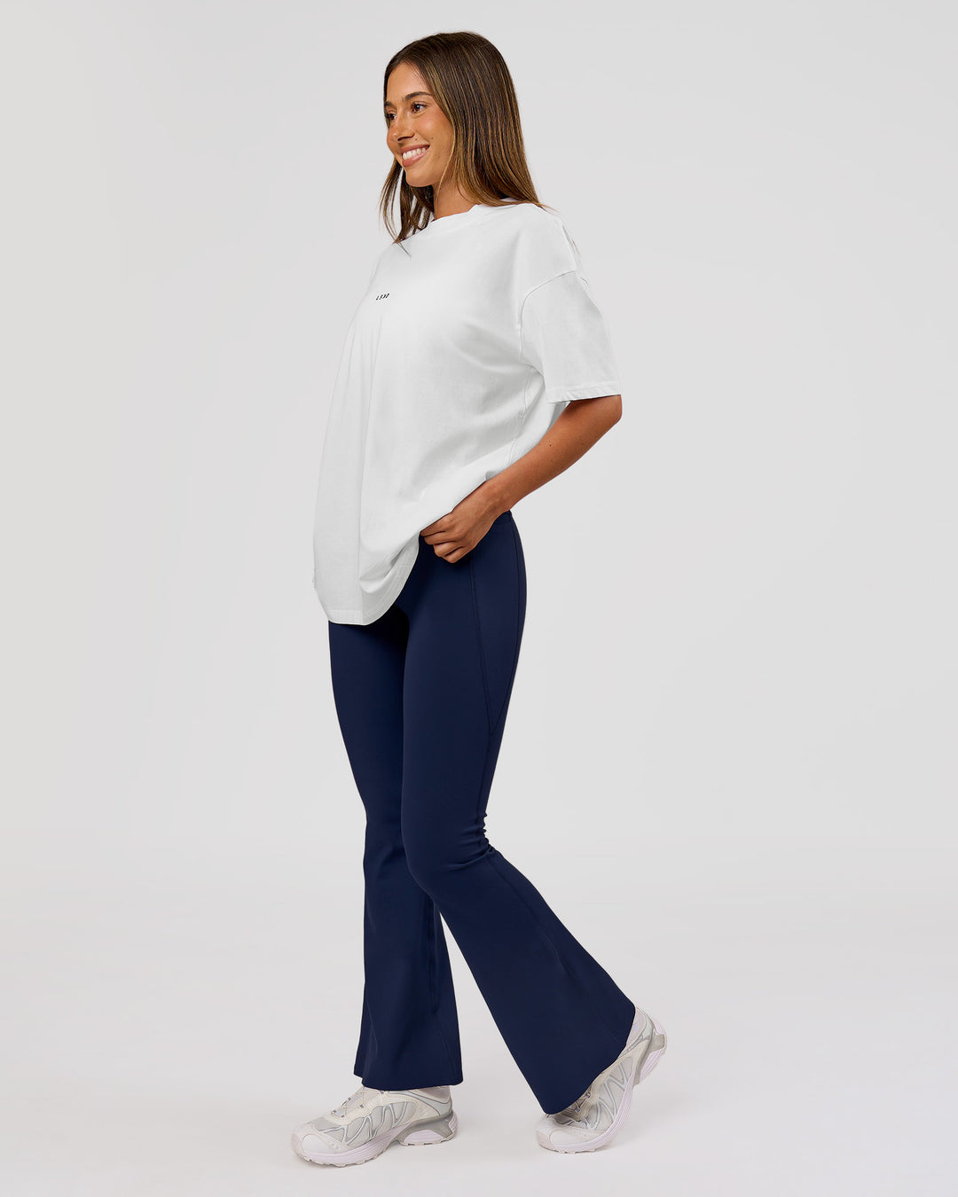 Woman wearing VS26 Journey FLXCotton Oversize Tee - White-Black | Model:Charli | Size:XS - view 12