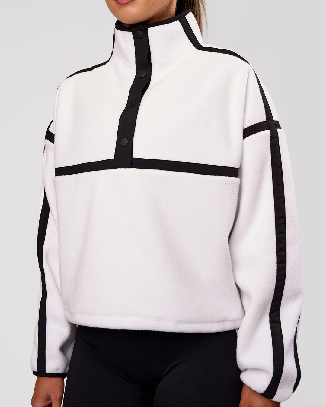Woman wearing Expedition Pop Over - White-Black | Model:Charli | Size:XS - view 3