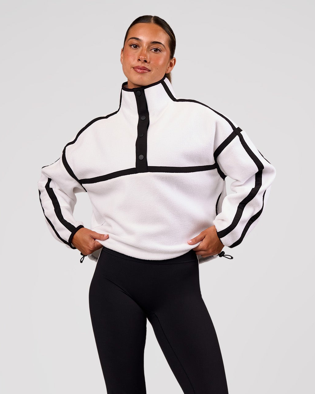 Woman wearing Expedition Pop Over - White-Black | Model:Charli | Size:XS - view 1