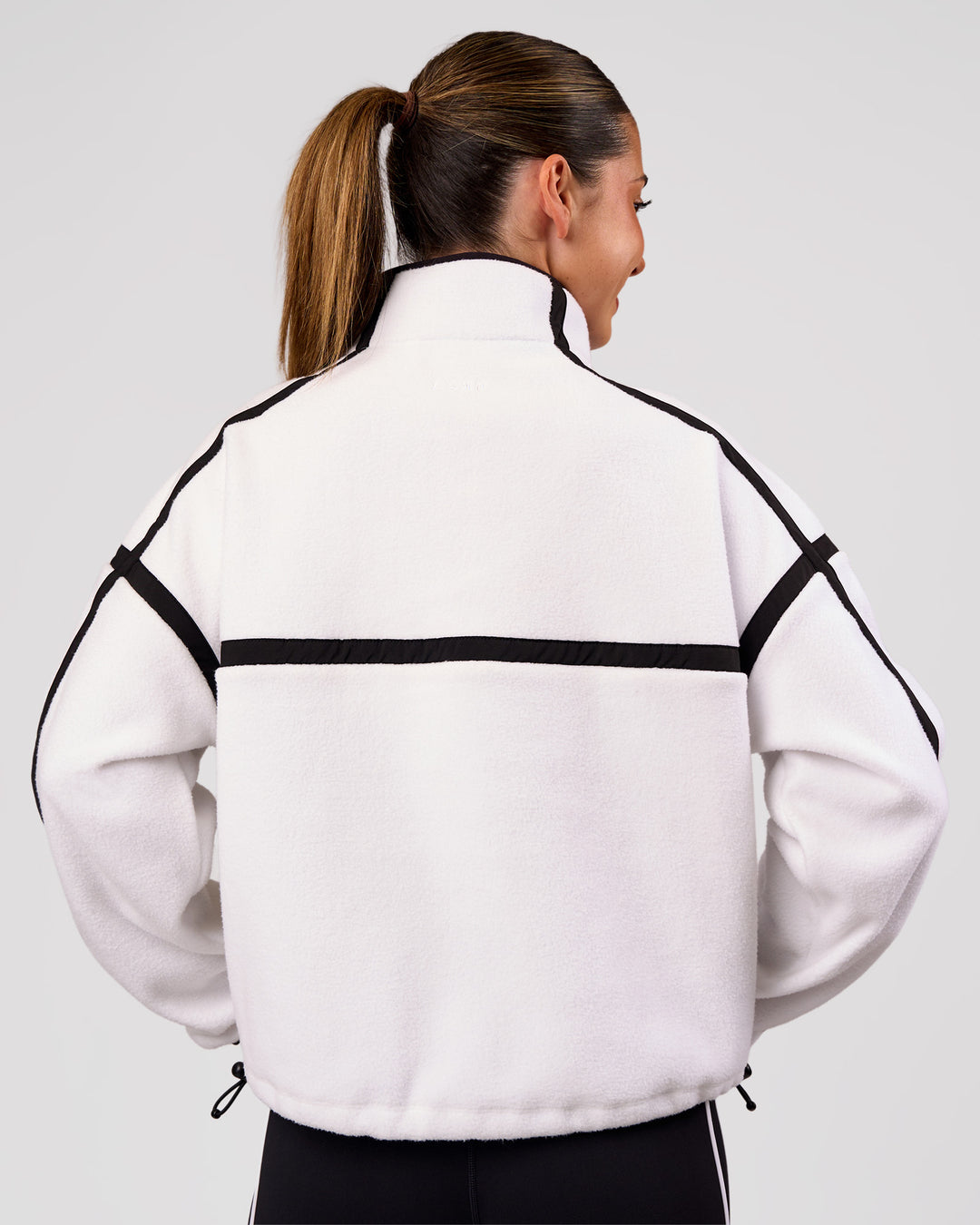 Woman wearing Expedition Pop Over - White-Black | Model:Charli | Size:XS - view 6