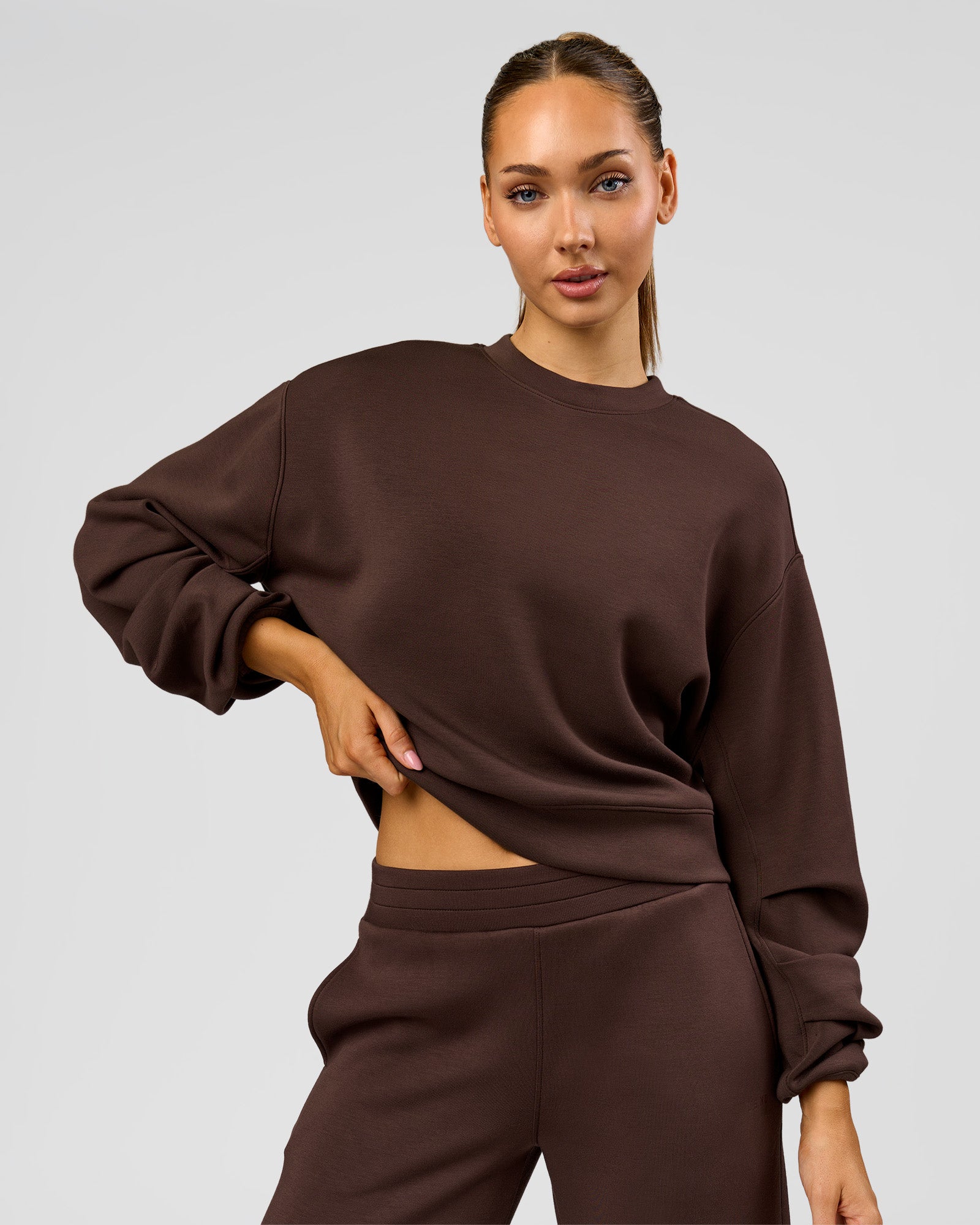Woman wearing Elevate SoftTouch Draped Sleeve Sweater - Hot Chocolate | Model:Claire | Size:XS
