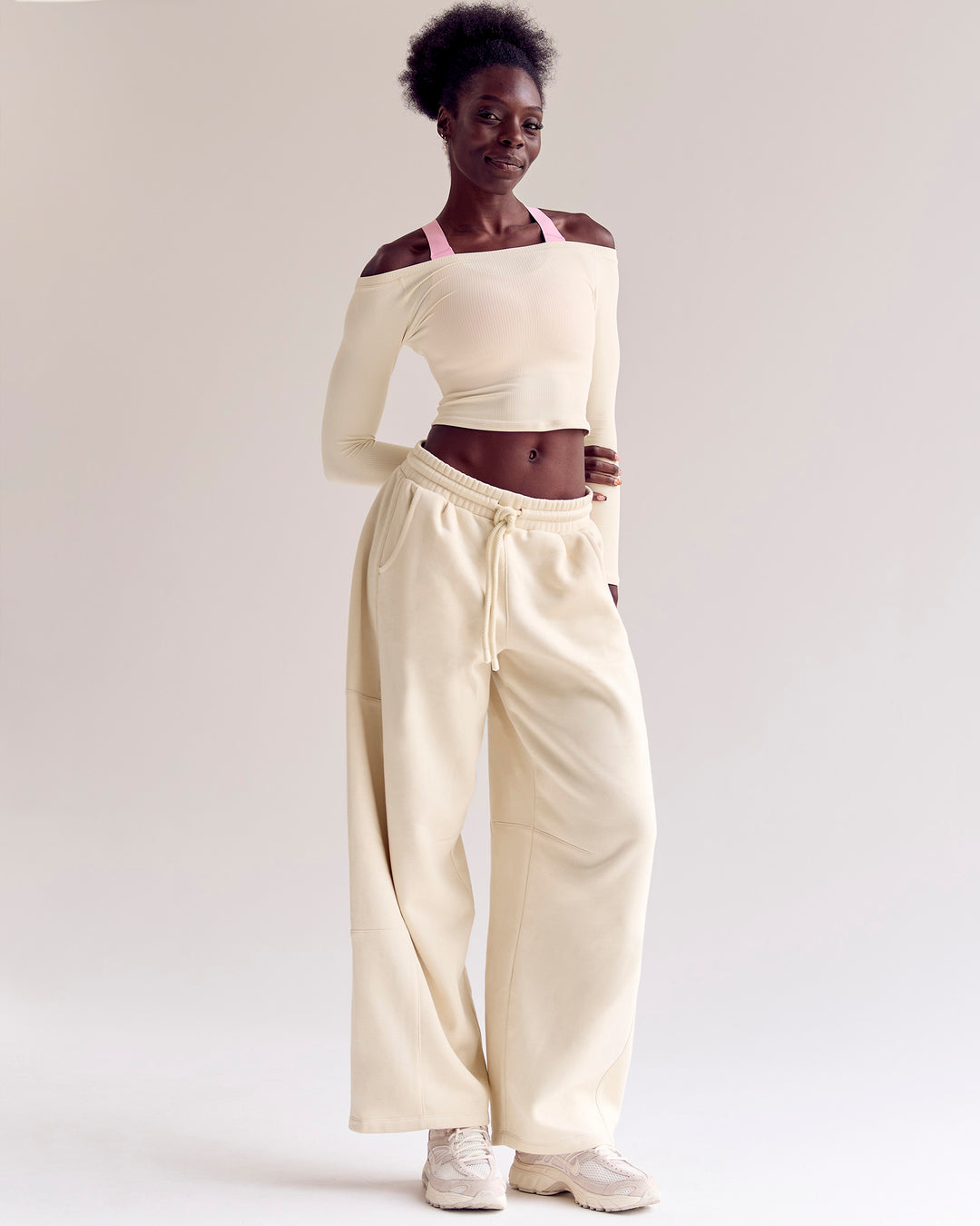 Woman wearing Bree Barrel Fleece Track Pant - Vanilla Bean | Model:Desleigh | Size:XS - view 8