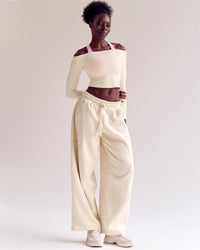 Woman wearing Bree Barrel Fleece Track Pant - Vanilla Bean | Model:Desleigh | Size:XS | Thumbnail Index: 7