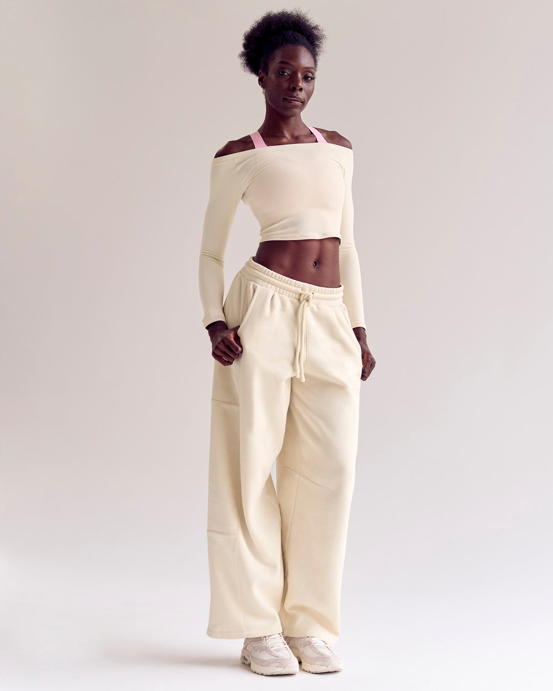 Woman wearing Bree Barrel Fleece Track Pant - Vanilla Bean | Model:Desleigh | Size:XS - view 3