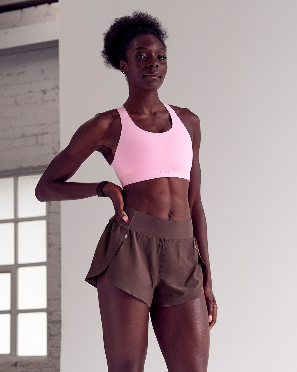 Woman wearing Pacer 3" Run Short - Cocoa Powder | Model:Desleigh | Size:XS - view 2