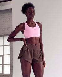 Woman wearing Pacer 3" Run Short - Cocoa Powder | Model:Desleigh | Size:XS | Thumbnail Index: 1