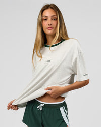 Woman wearing Be Here Now Heavyweight FLXCotton Tee Oversize - Silver Marl-Midnight Green | Model:Georgia | Size:XS | Thumbnail Index: 12