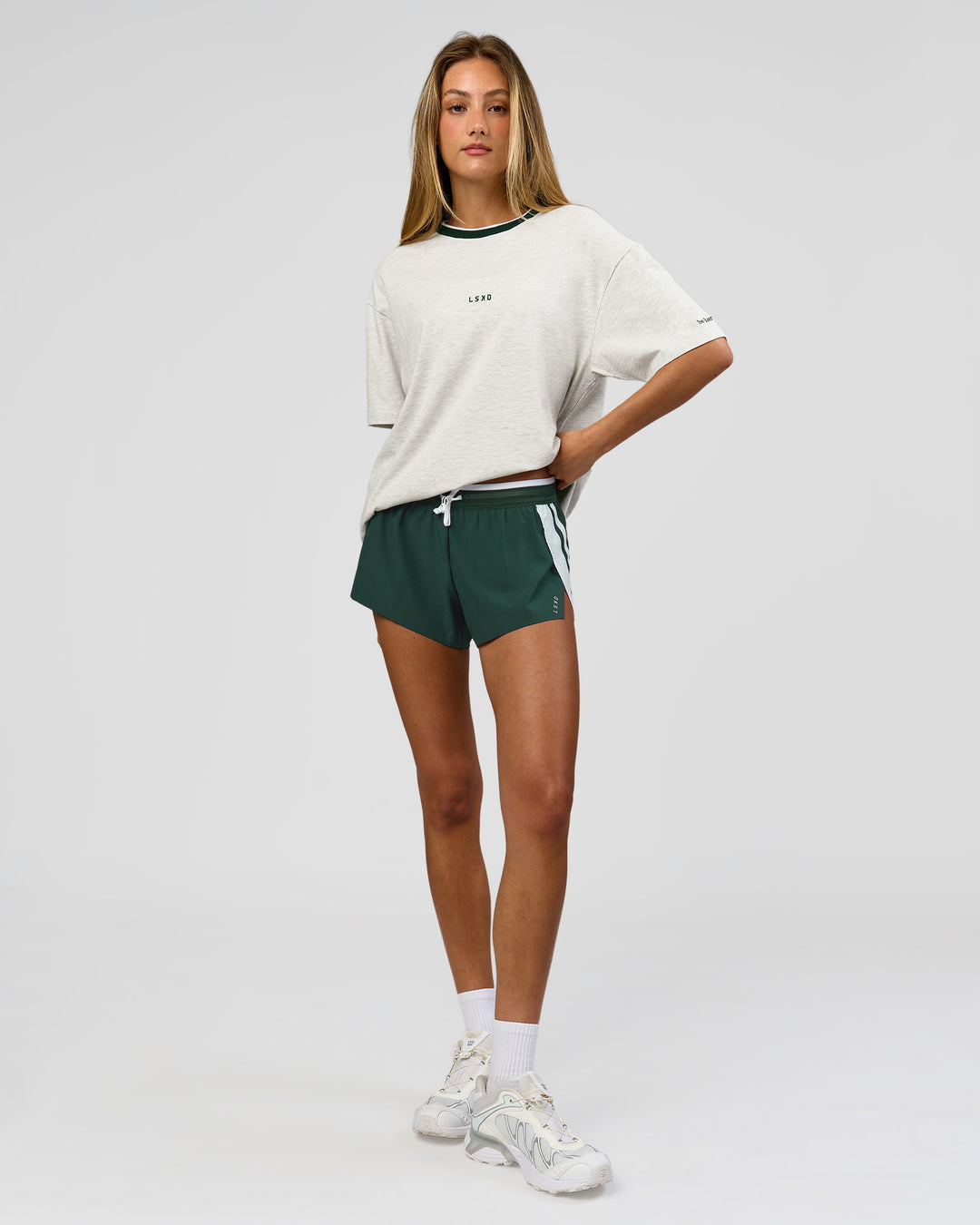 Woman wearing Be Here Now Heavyweight FLXCotton Tee Oversize - Silver Marl-Midnight Green | Model:Georgia | Size:XS - view 11
