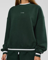 Woman wearing Go-To Dual Oversized Sweater - Midnight Green-White | Model:Georgia | Size:XS | Thumbnail Index: 2