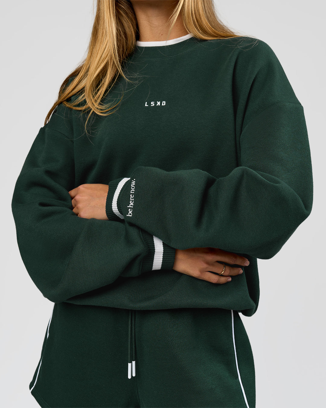 Woman wearing Go-To Dual Oversized Sweater - Midnight Green-White | Model:Georgia | Size:XS - view 1