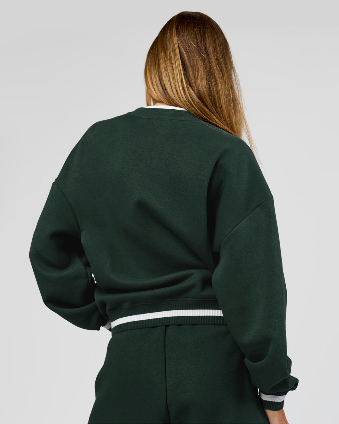 Woman wearing Go-To Dual Oversized Sweater - Midnight Green-White | Model:Georgia | Size:XS - view 6