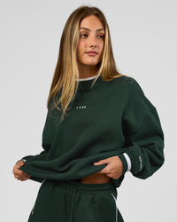 Woman wearing Go-To Dual Oversized Sweater - Midnight Green-White | Model:Georgia | Size:XS | Thumbnail Index: 7