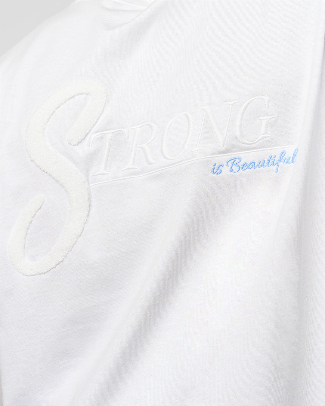 Woman wearing Strong is Beautiful Heavyweight Oversized Tee - White | Model:Georgia | Size:XS - view 16