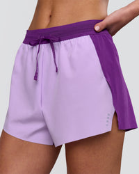 Woman wearing Accelerate 3" High-Rise Running Short - Chloe Purple | Model:Issy | Size:XS | Thumbnail Index: 0