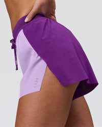 Woman wearing Accelerate 3" High-Rise Running Short - Chloe Purple | Model:Issy | Size:XS | Thumbnail Index: 5