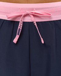 Woman wearing Accelerate 3" High-Rise Running Short - Future Navy-Varsity print | Model:Issy | Size:XS | Thumbnail Index: 2