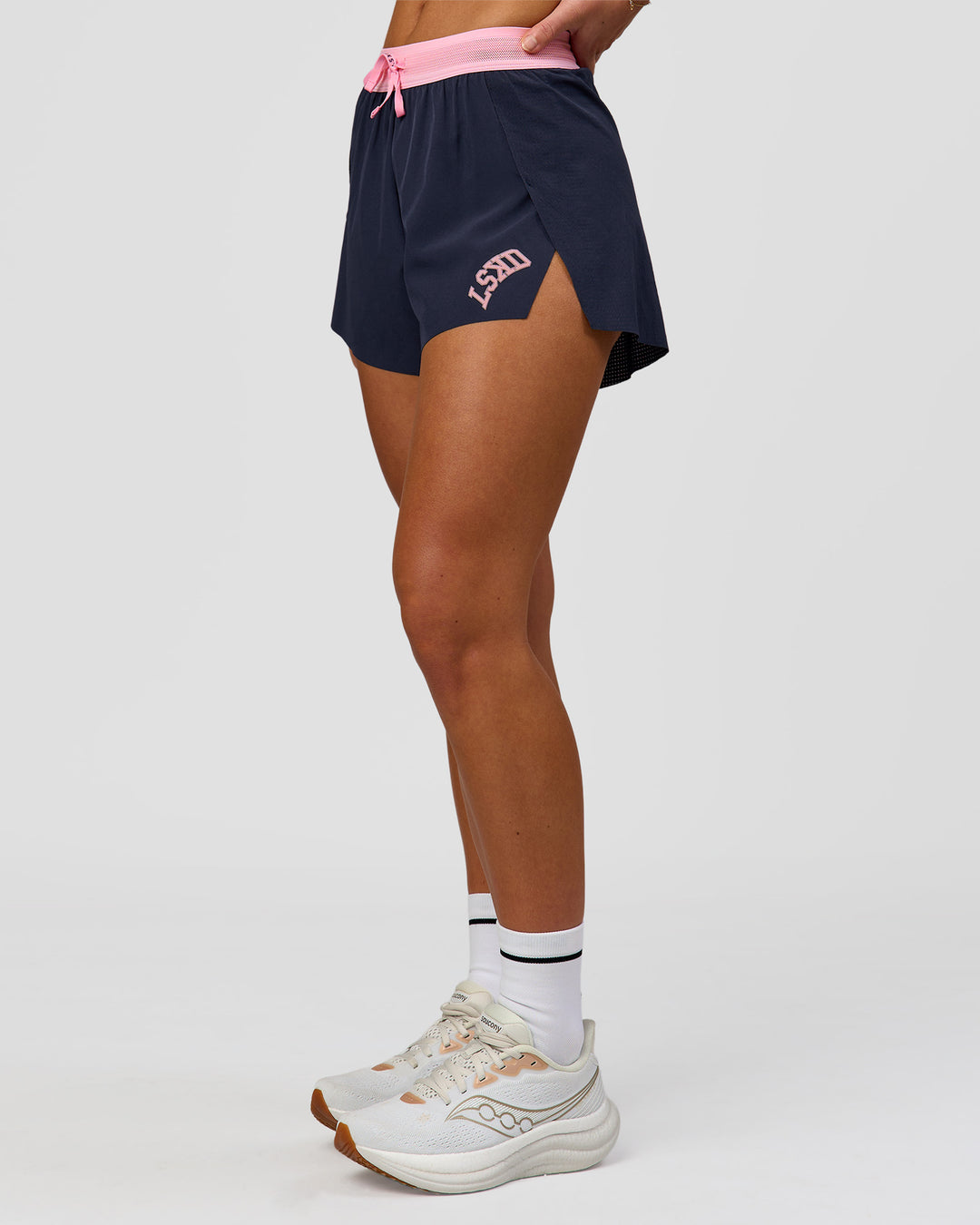Woman wearing Accelerate 3" High-Rise Running Short - Future Navy-Varsity print | Model:Issy | Size:XS - view 5