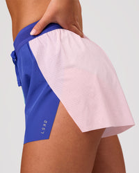 Woman wearing Accelerate 3" High-Rise Running Short - Power Cobalt-Prism | Model:Issy | Size:XS | Thumbnail Index: 8
