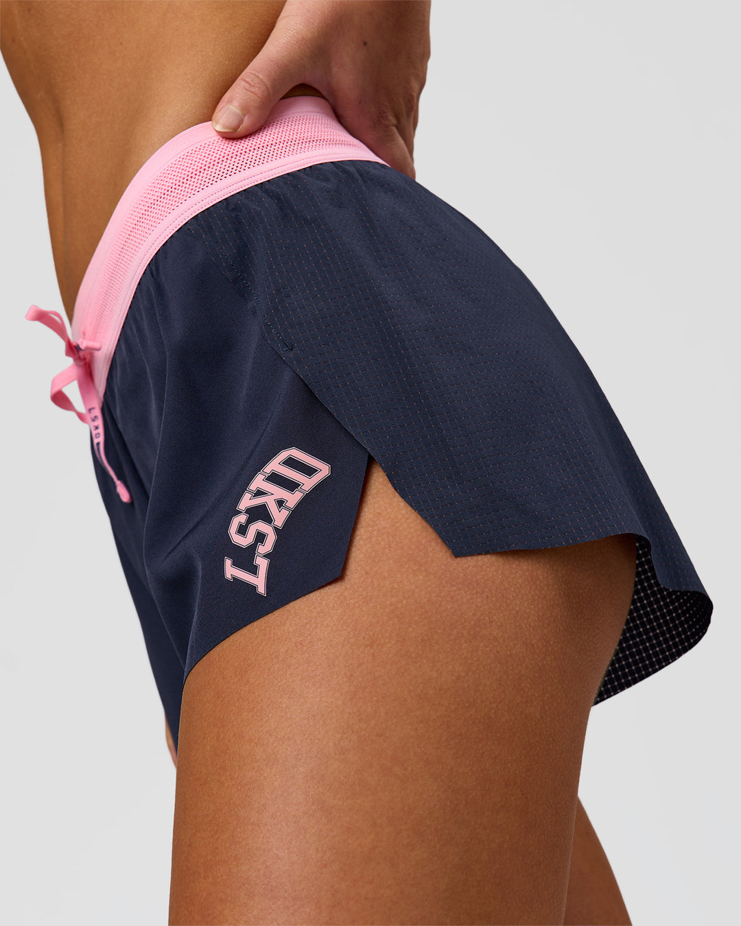 Woman wearing Accelerate 3" Mid-Rise Running Short - Future Navy-Varsity Print | Model:Issy | Size:XS - view 4
