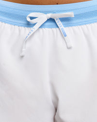 Woman wearing Accelerate 3" Mid-Rise Running Short - Open Air-White | Model:Issy | Size:XS | Thumbnail Index: 15