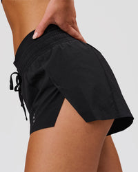 Woman wearing Accelerate Synergy 3" Running Short Short - Black-Black | Model:Issy | Size:XS | Thumbnail Index: 6