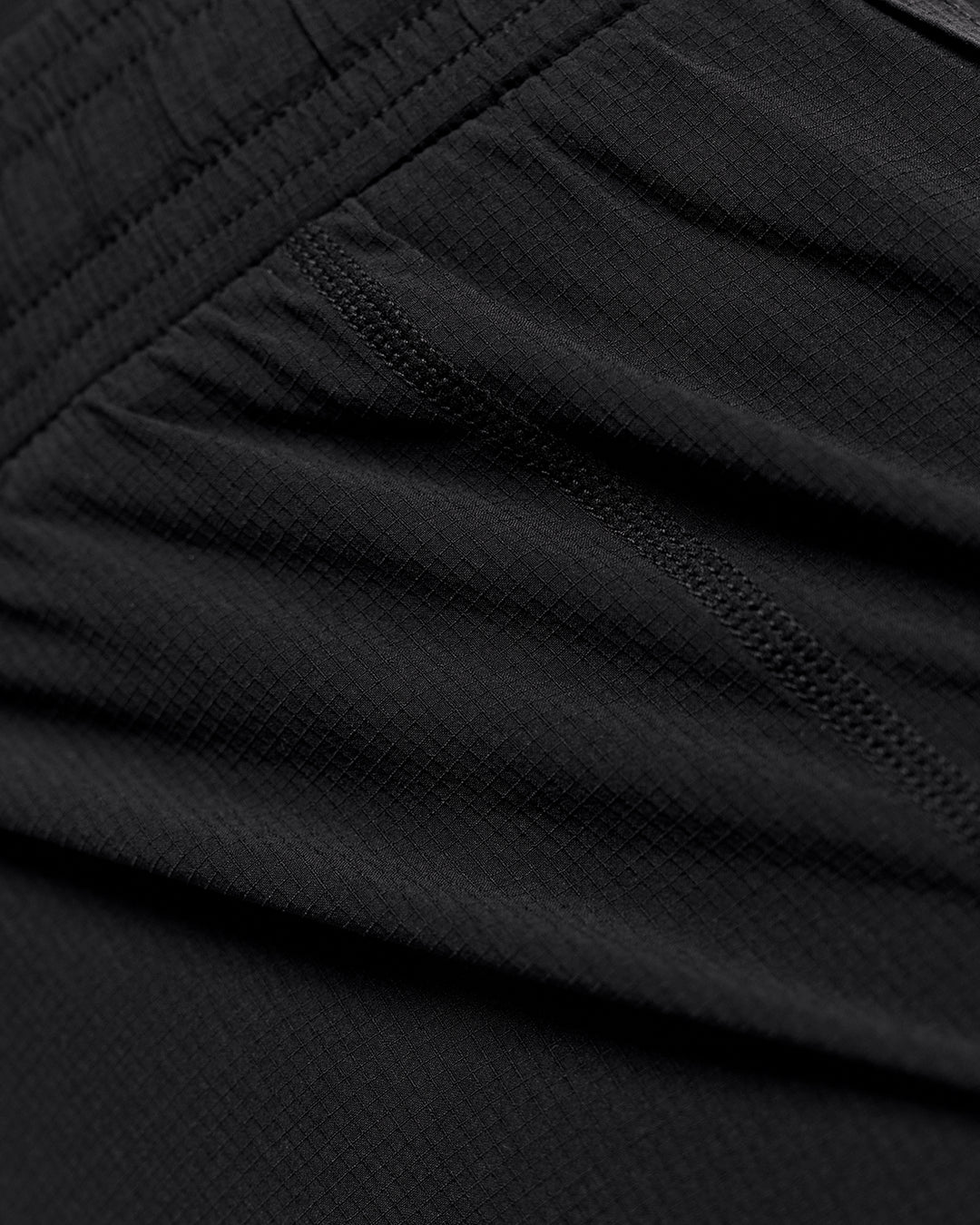 Woman wearing Accelerate Synergy 3" Running Short Short - Black-Black | Model:Issy | Size:XS - view 12