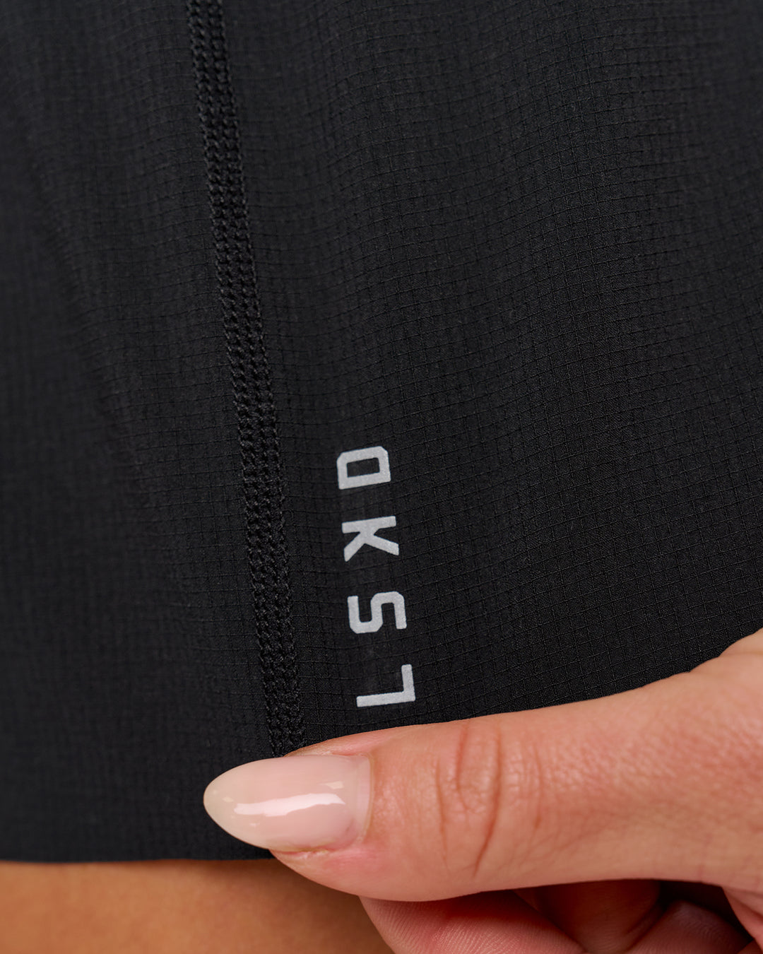 Woman wearing Accelerate Synergy 3" Running Short Short - Black-Black | Model:Issy | Size:XS - view 15