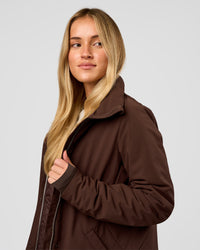 Woman wearing Auxiliary 2.0 Longline Jacket - Hot Chocolate | Model:Issy | Size:XS | Thumbnail Index: 4