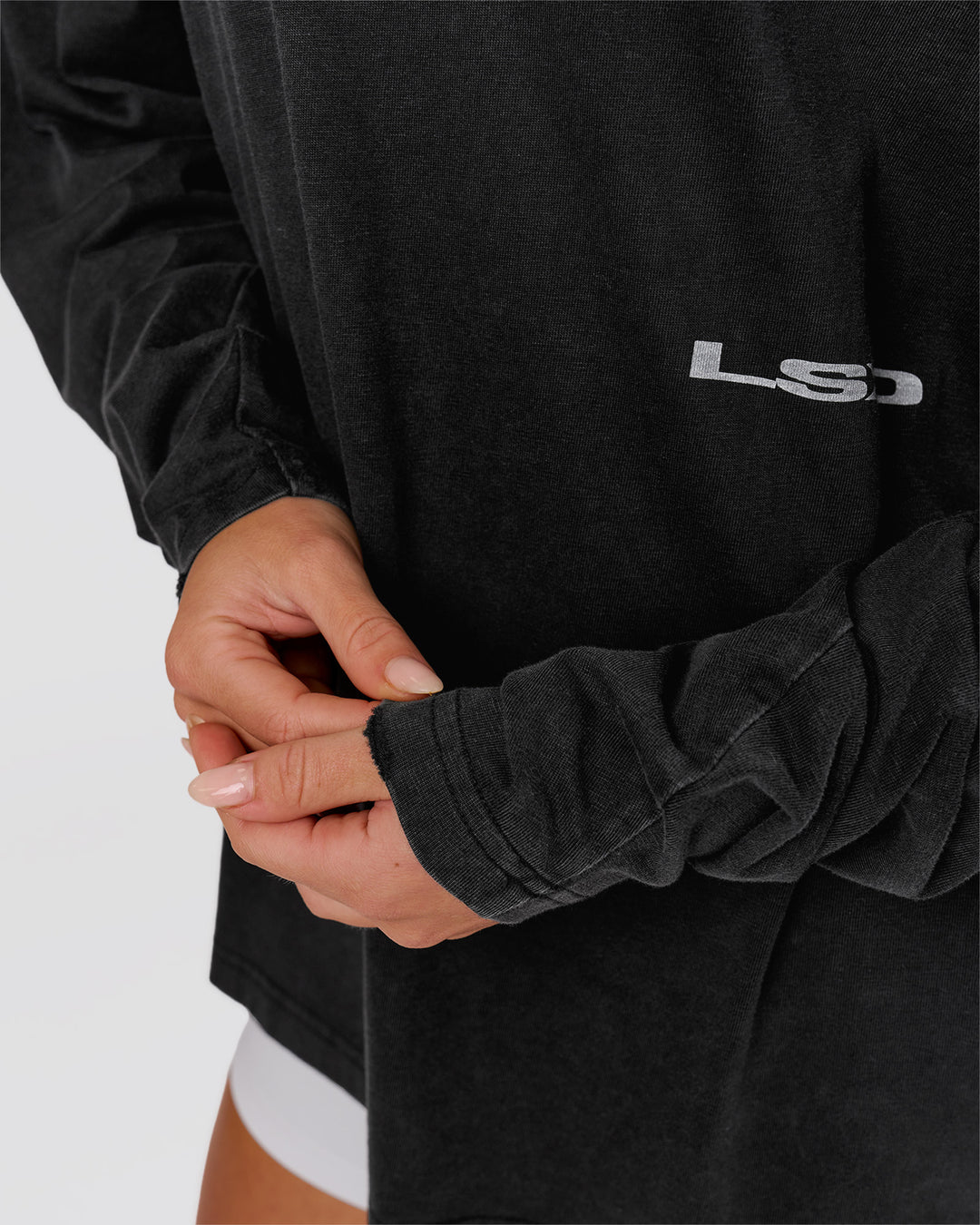 Woman wearing Backline Washed Heavyweight Oversized LS Tee - Black Washed | Model:Issy | Size:XS - view 8