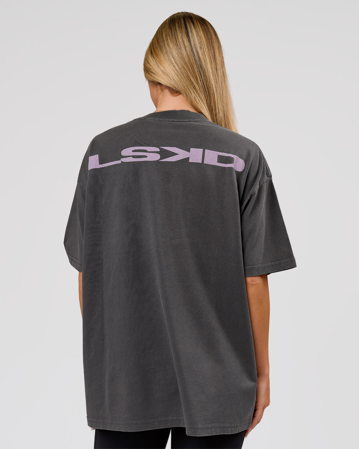 Woman wearing Backline Washed Heavyweight Oversized Tee - Asphalt Washed | Model:Issy | Size:XS - view 2