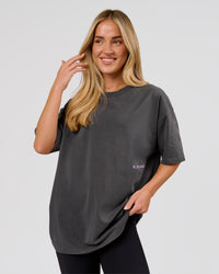 Woman wearing Backline Washed Heavyweight Oversized Tee - Asphalt Washed | Model:Issy | Size:XS | Thumbnail Index: 5