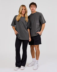 Woman wearing Backline Washed Heavyweight Oversized Tee - Asphalt Washed | Model:Issy | Size:XS | Thumbnail Index: 15