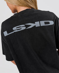 Woman wearing Backline Washed Heavyweight Oversized Tee - Black Washed | Model:Issy | Size:XS | Thumbnail Index: 19