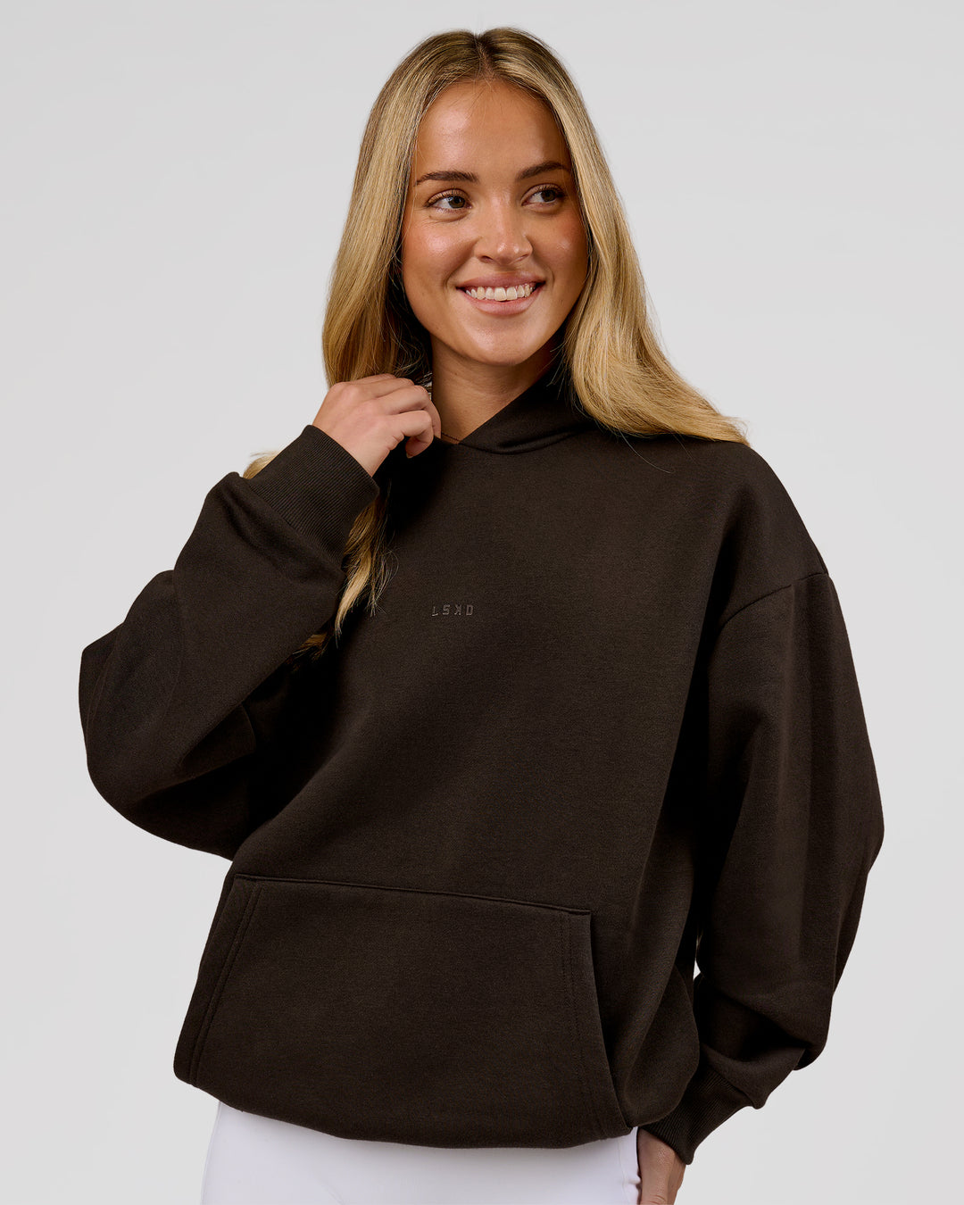 Woman wearing Base Oversized Hoodie - Ground Coffee | Model:Issy | Size:XS - view 10