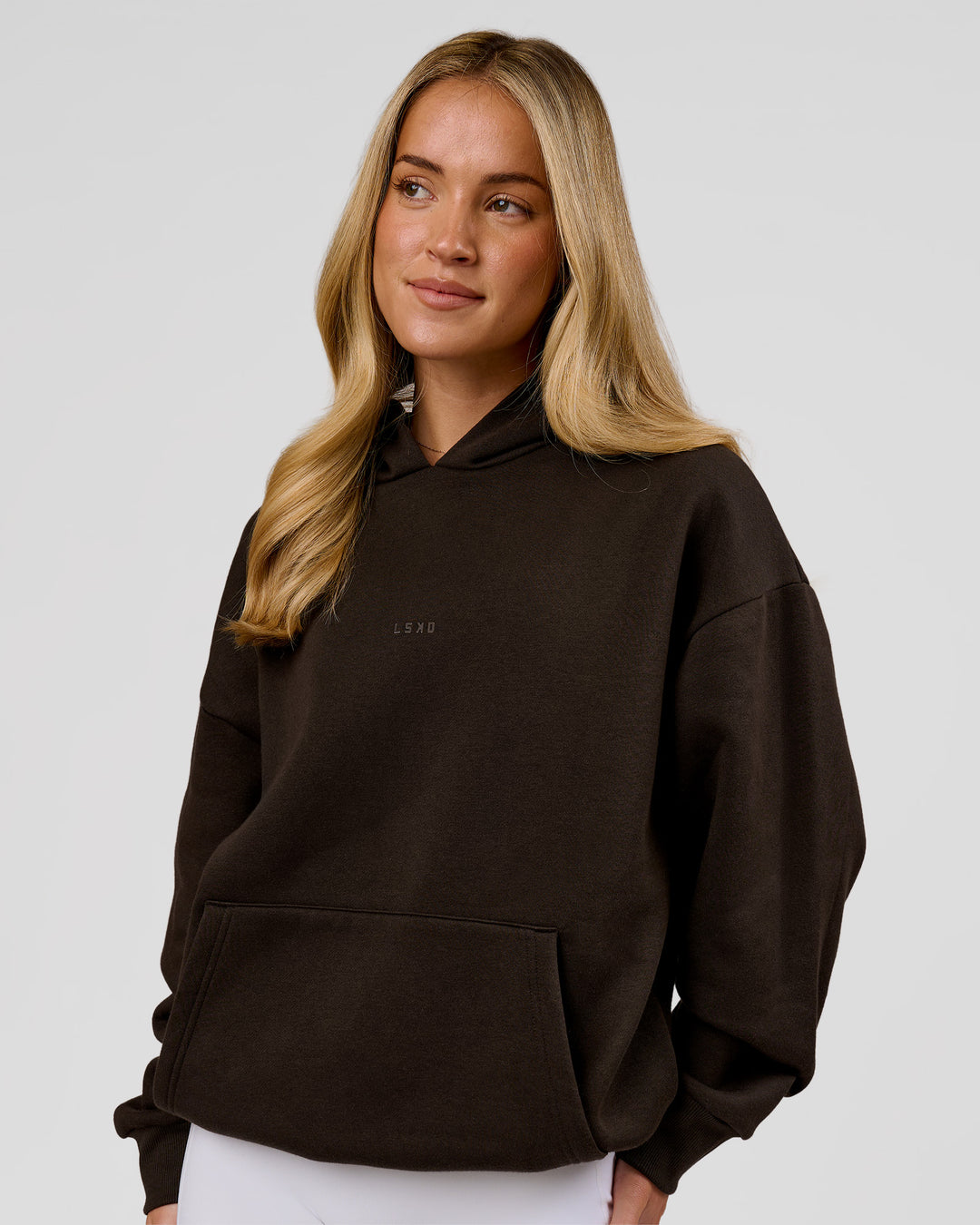 Woman wearing Base Oversized Hoodie - Ground Coffee | Model:Issy | Size:XS - view 12
