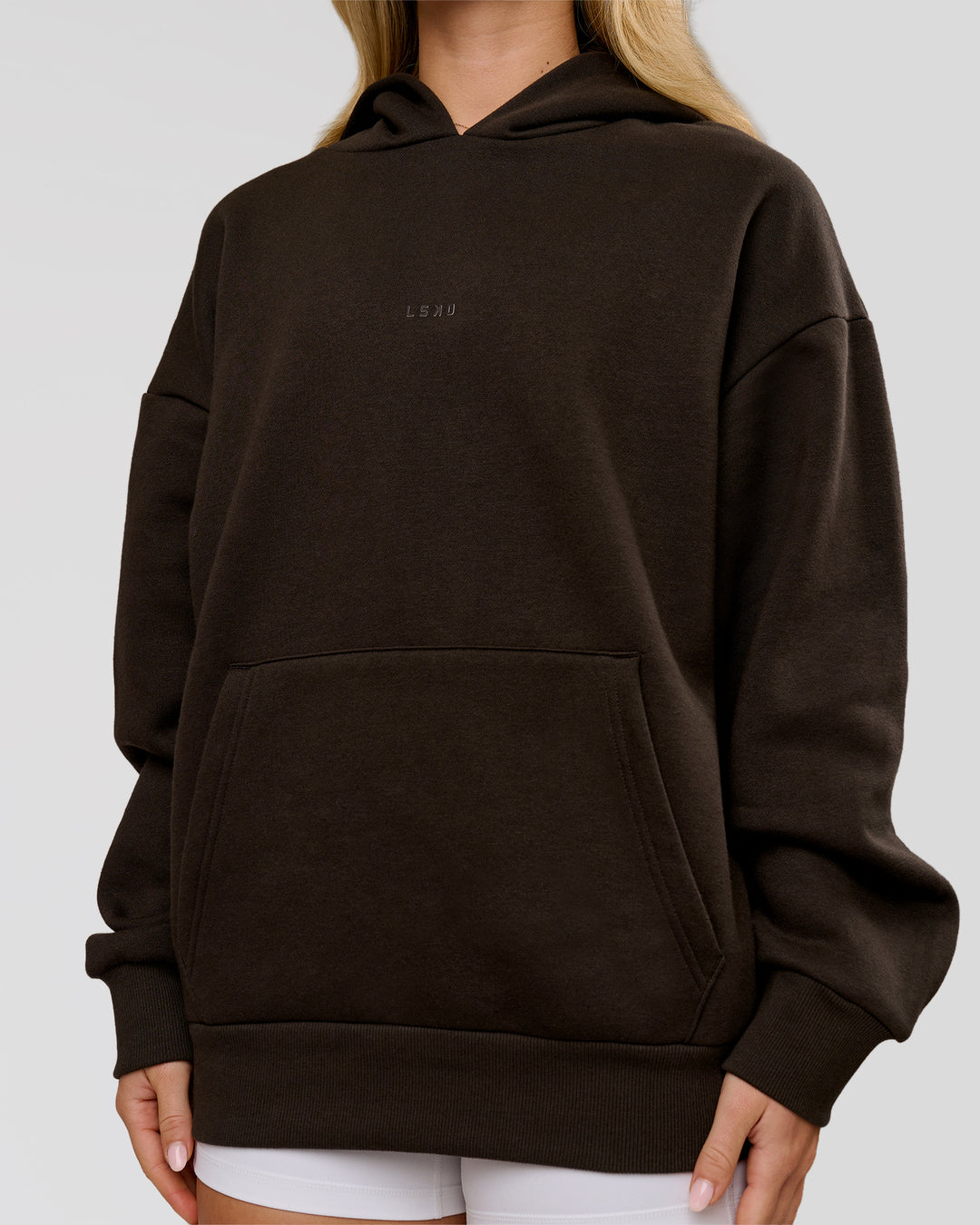 Woman wearing Base Oversized Hoodie - Ground Coffee | Model:Issy | Size:XS - view 14