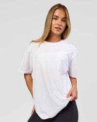 Woman wearing Benchmark FLXCotton Oversized Tee - White-Pale Lilac | Model:Issy | Size:XS | Thumbnail Index: 5