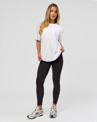 Woman wearing Benchmark FLXCotton Oversized Tee - White-Pale Lilac | Model:Issy | Size:XS | Thumbnail Index: 15