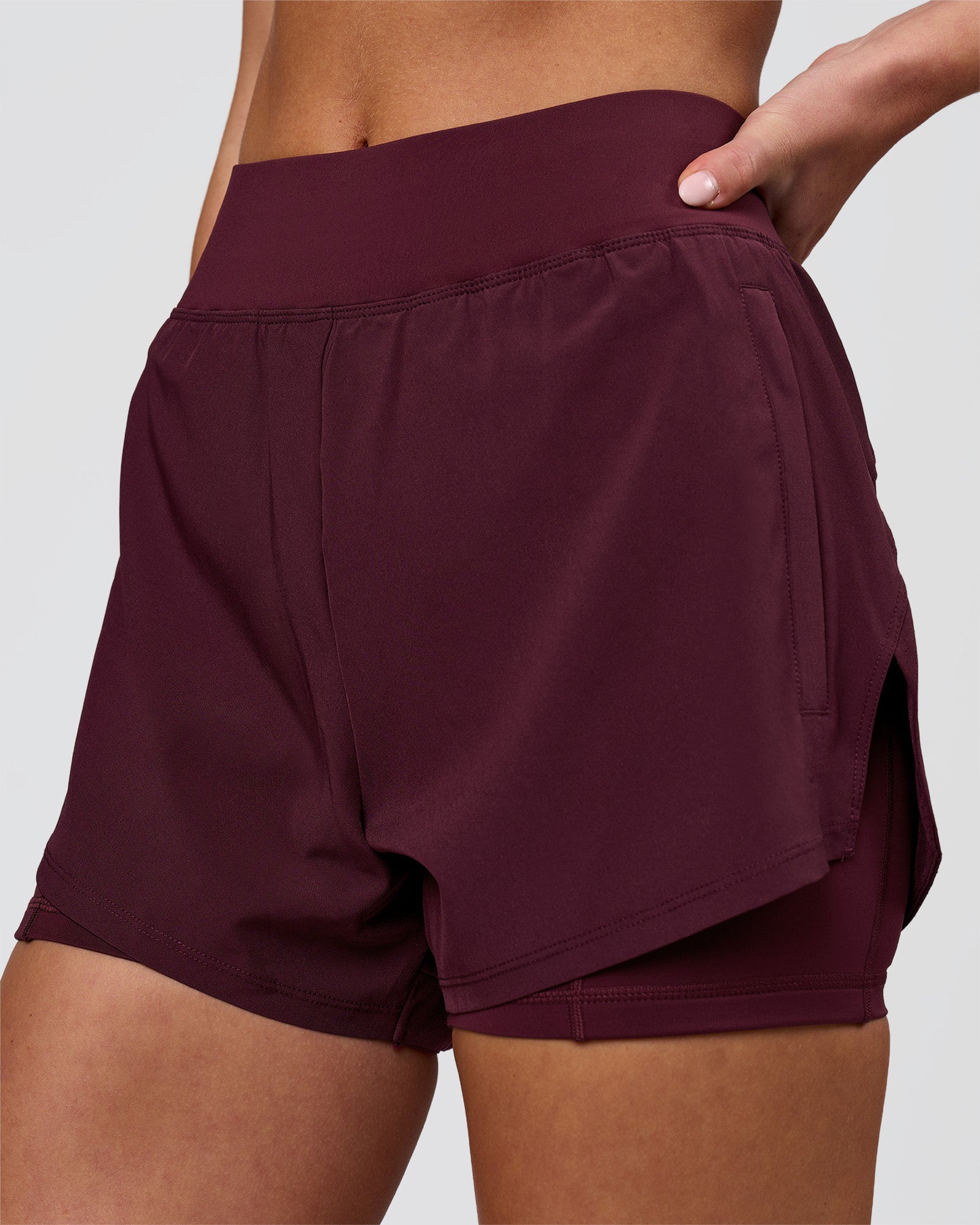 Woman wearing Challenger 3" Lined Performance Short - Cherry Lacquer | Model:Issy | Size:XS