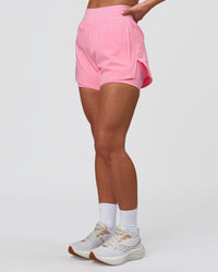 Woman wearing Challenger 3" Lined Performance Short - Pink Rose | Model:Issy | Size:XS | Thumbnail Index: 4