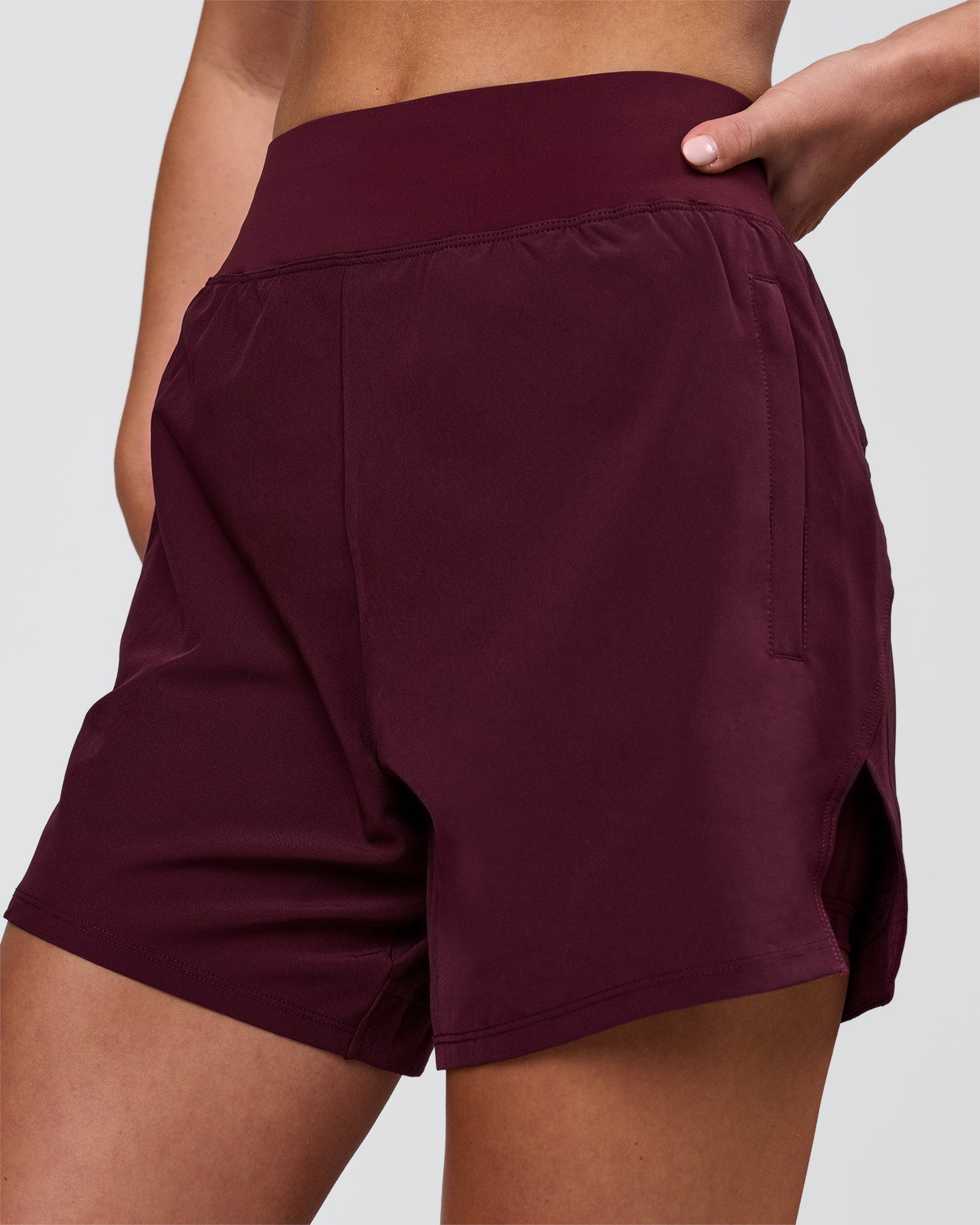 Woman wearing Challenger 5" Lined Performance Short - Cherry Lacquer | Model:Issy | Size:XS