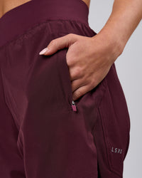 Woman wearing Challenger 5" Lined Performance Short - Cherry Lacquer | Model:Issy | Size:XS | Thumbnail Index: 6