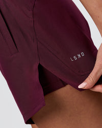 Woman wearing Challenger 5" Lined Performance Short - Cherry Lacquer | Model:Issy | Size:XS | Thumbnail Index: 8
